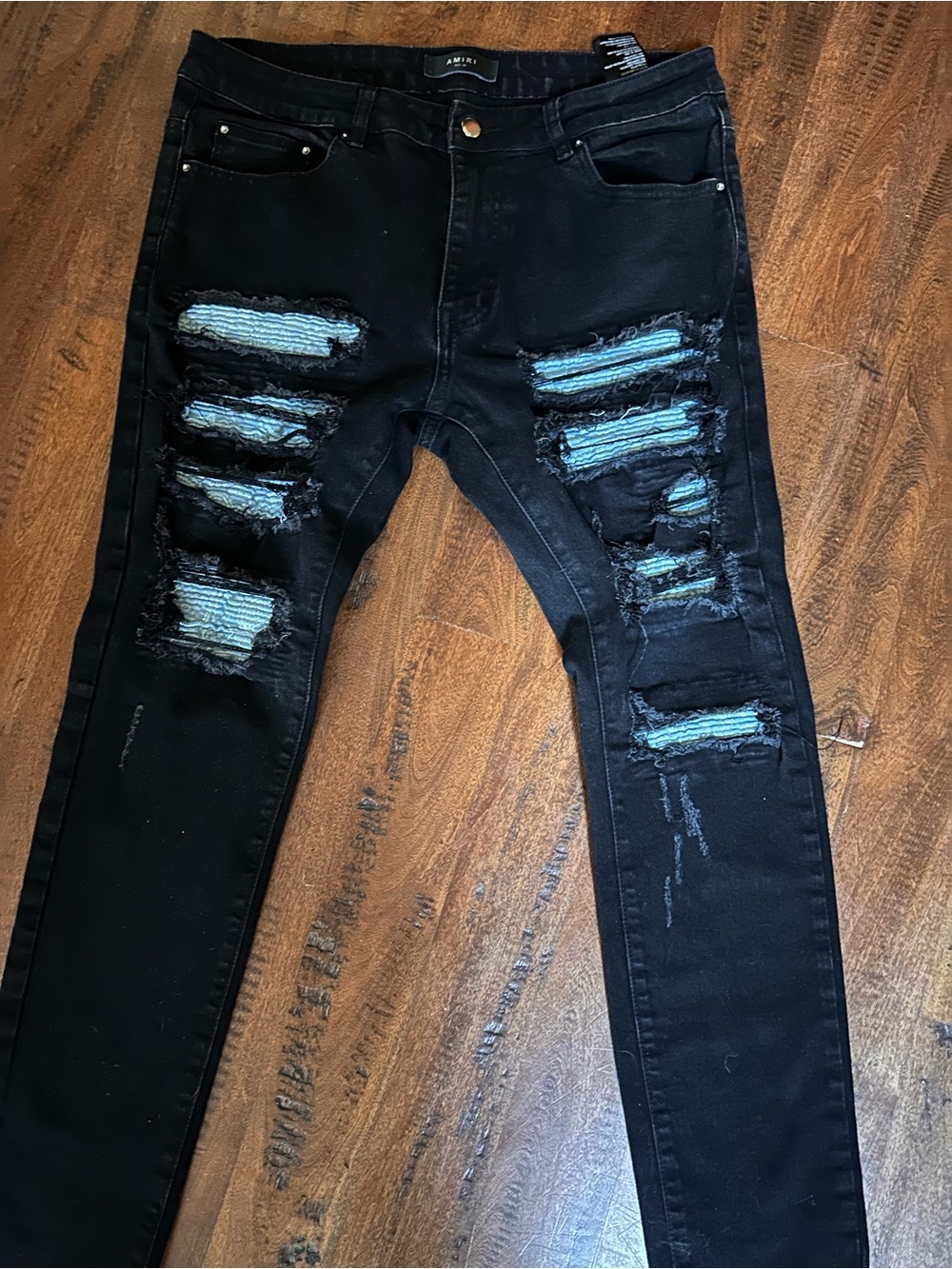 AMIRI Black Skinny Jeans with Light Blue Paisley Patch Distressing